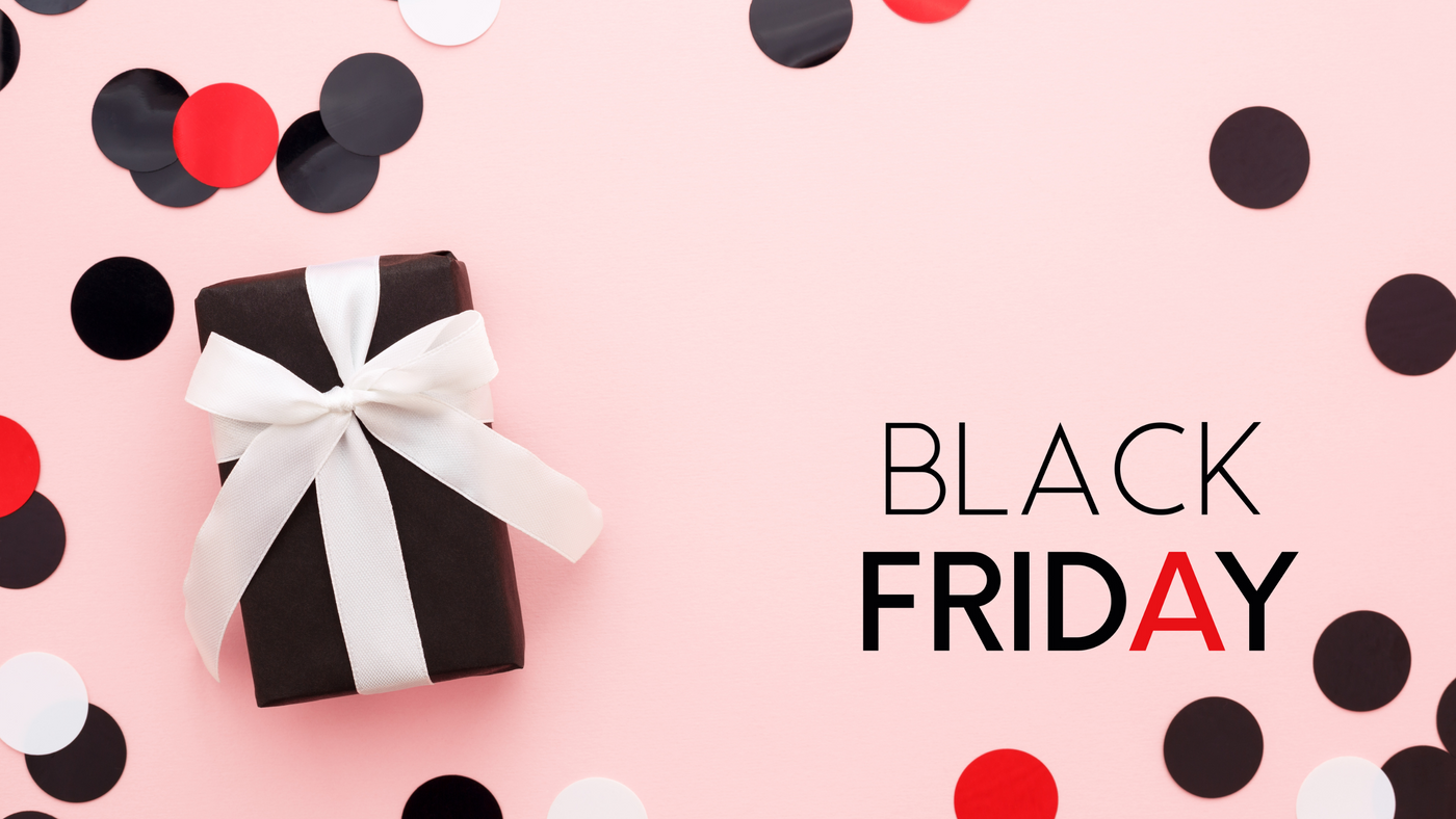 black friday slogan on a pink background with black gift