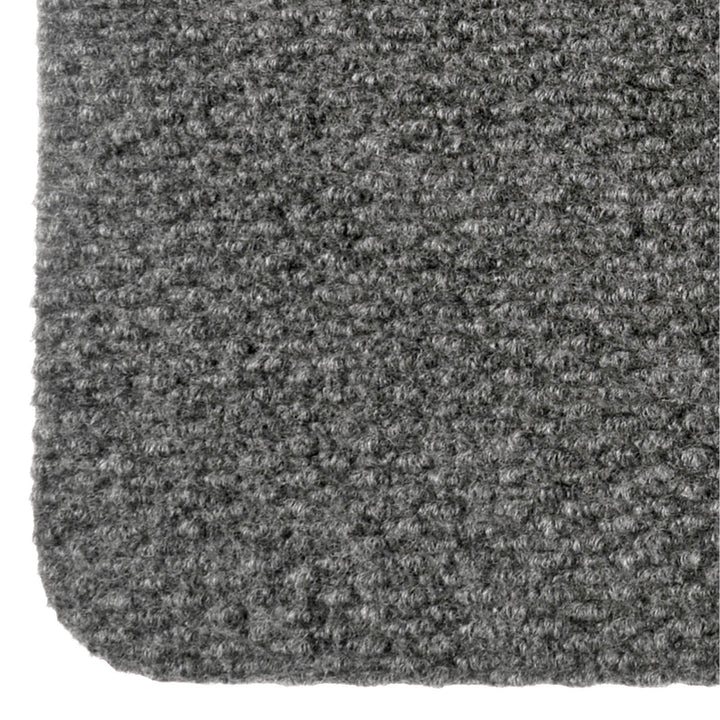 Close up of the textured pile on a grey doormat