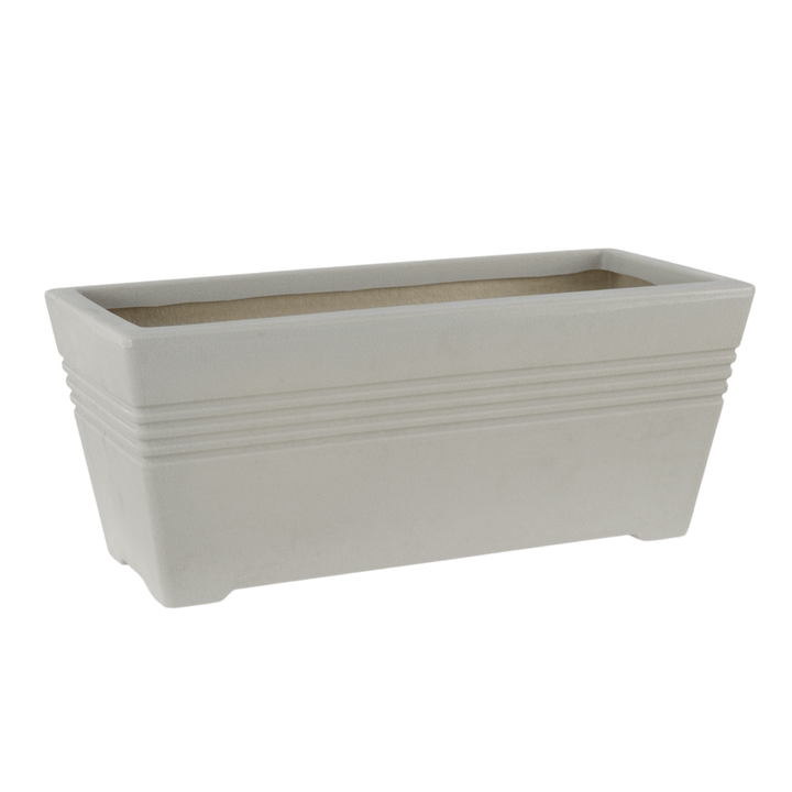 stone coloured trough rectangle shaped planter with ridged indent details to the top on white background