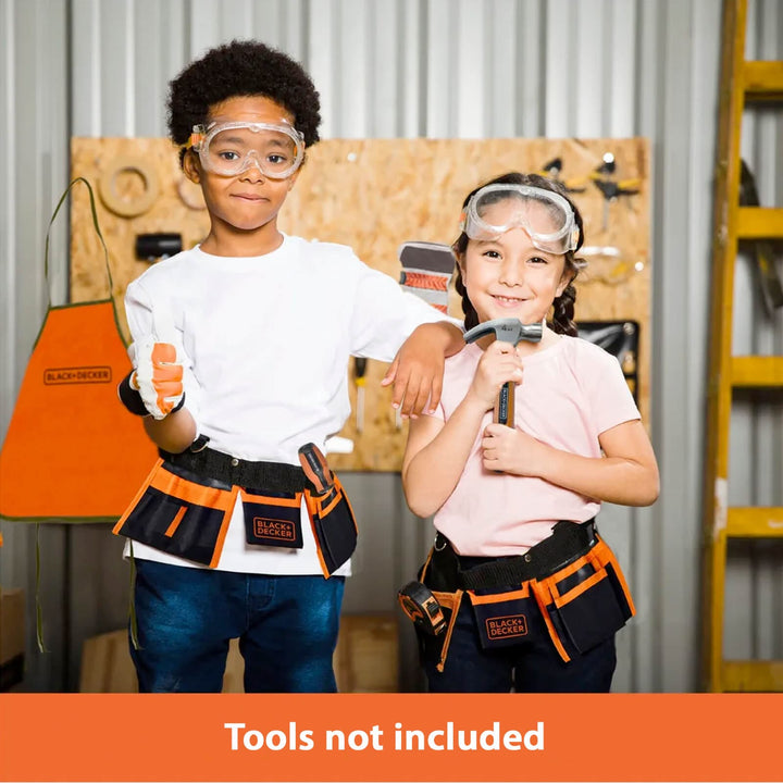 Boy and girl wearing black and orange tool belts and goggles for DIY play