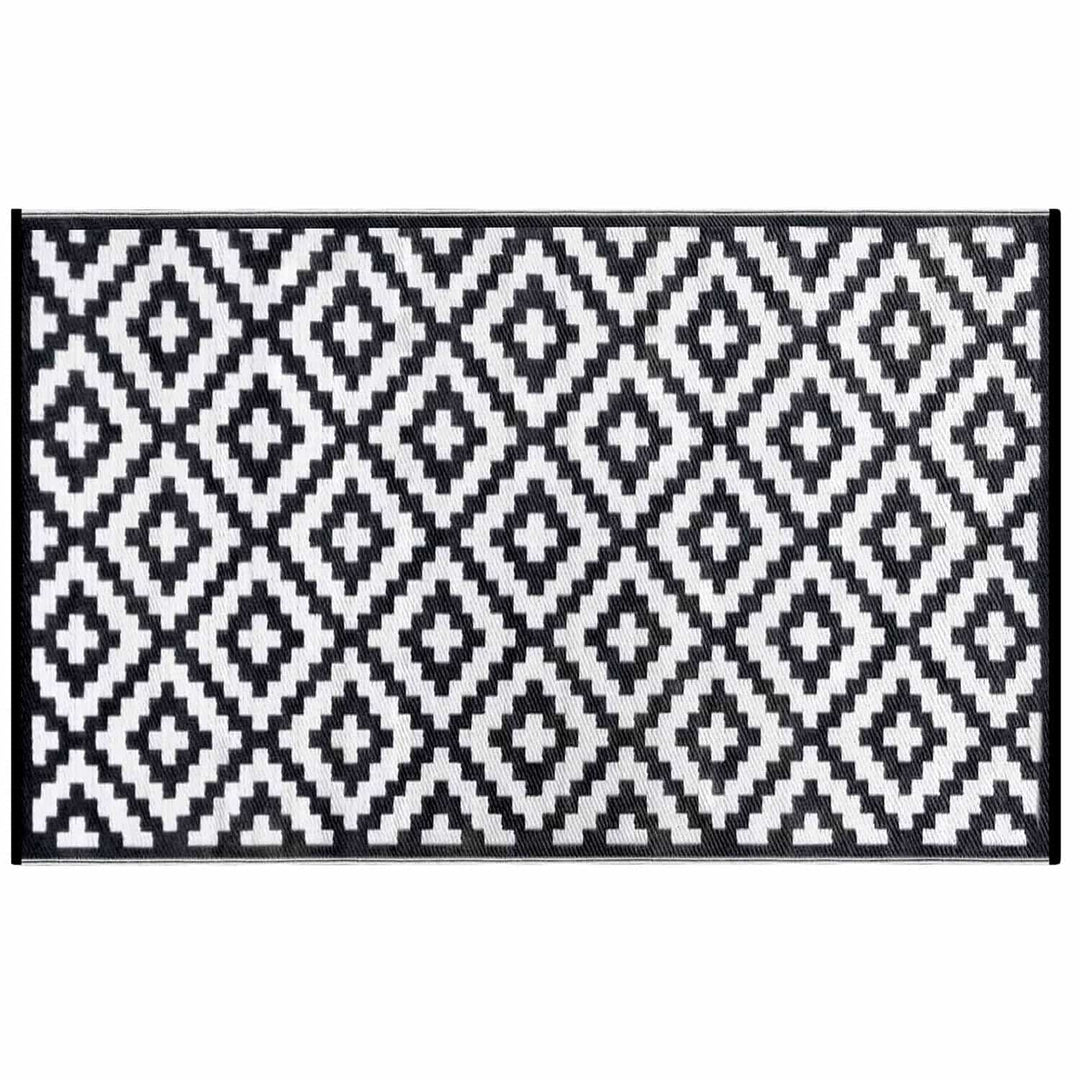 Black and white diamond pattern outdoor rug