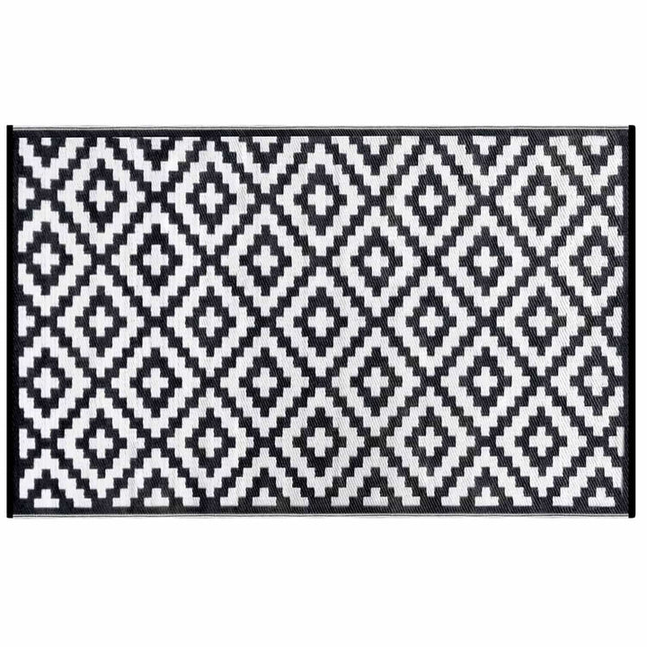 Black and white diamond pattern outdoor rug