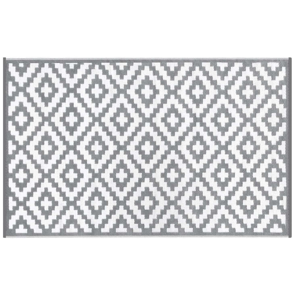 Grey and white diamond pattern rug for indoor and outdoor use