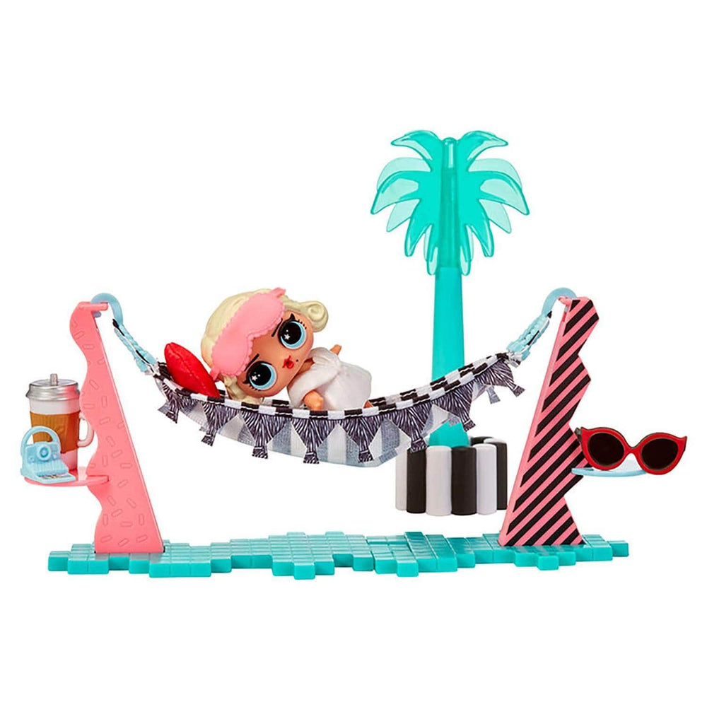 Leading Baby doll lying on a hammock beside a palm tree