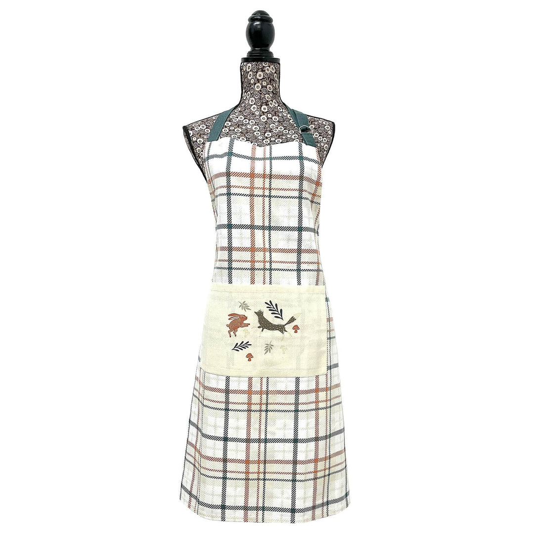 Woodland design and check pattern chef's apron on a tailors dummy