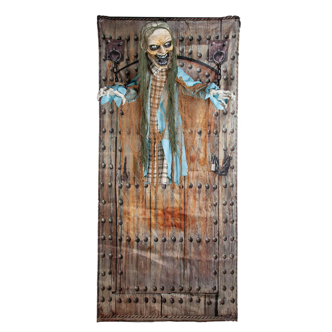 Zombie fire chained to a prison door Halloween decoration