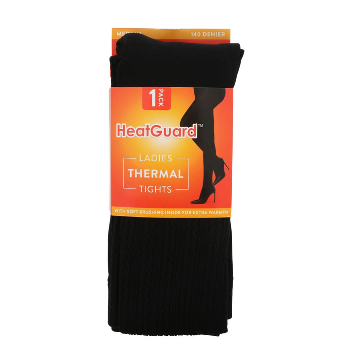 Pack of HeatGuard ladies' thermal tights on an orange background