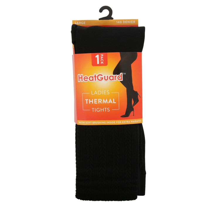 Packaged black thermal tights with HeatGuard branding on an orange label.
