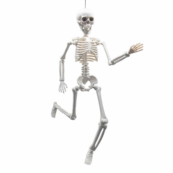 Skeleton figure in a running pose on a white background