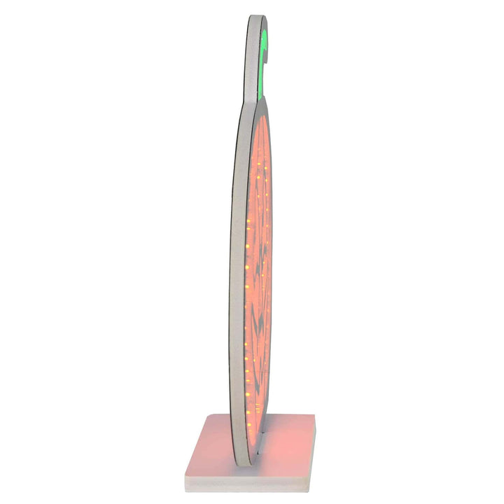 Side view of an orange pumpkin infinity mirror light with white base