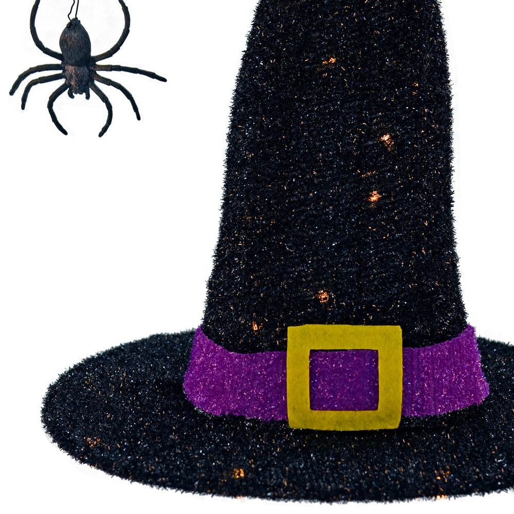 Close up of black witch hat with LED lights