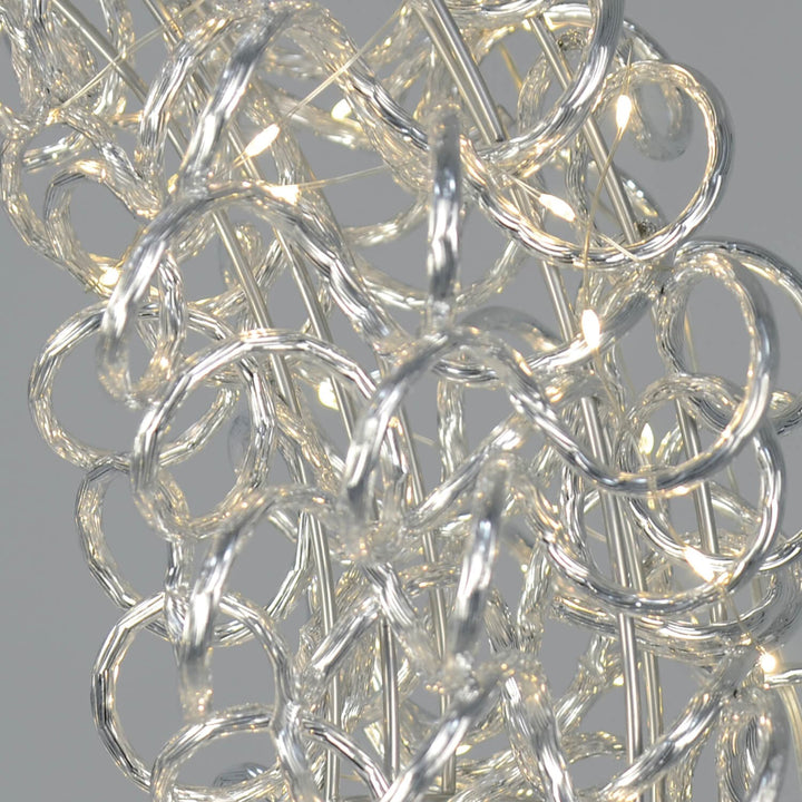 Close up of warm white LEd lights on an aluminium looped frame Christmas wreath