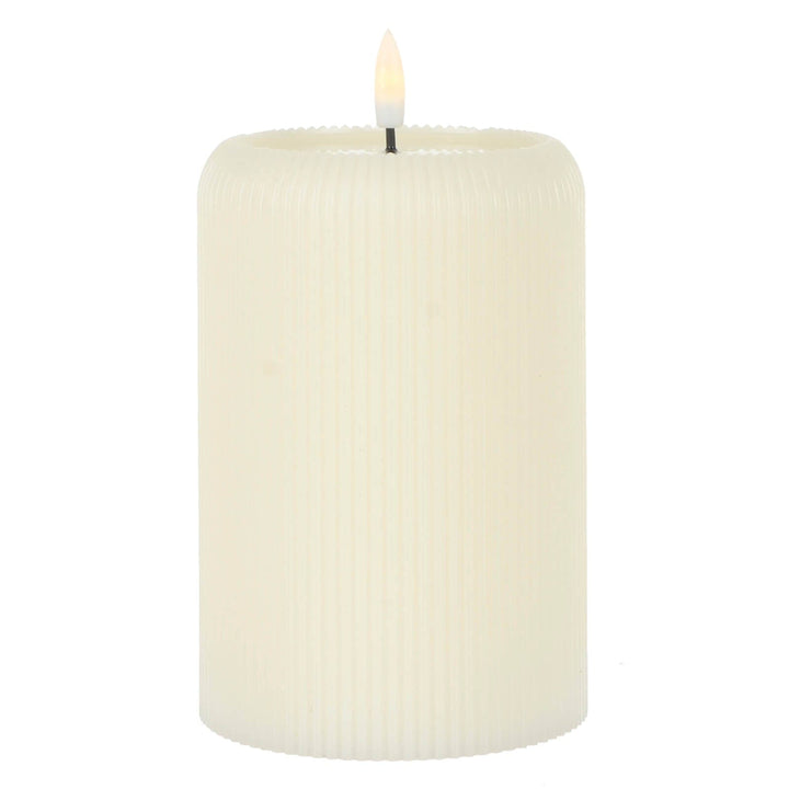 Cream colour ridged candle with artificial flame