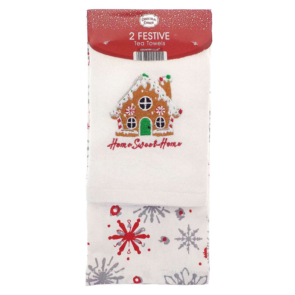 Pack of two festive tea towels with gingerbread house design on a white background