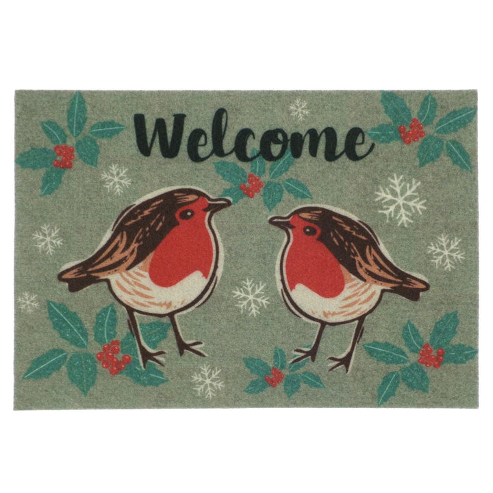 Doormat with two robins, holly leaves, and snowflakes on a green background with the word 'Welcome'.