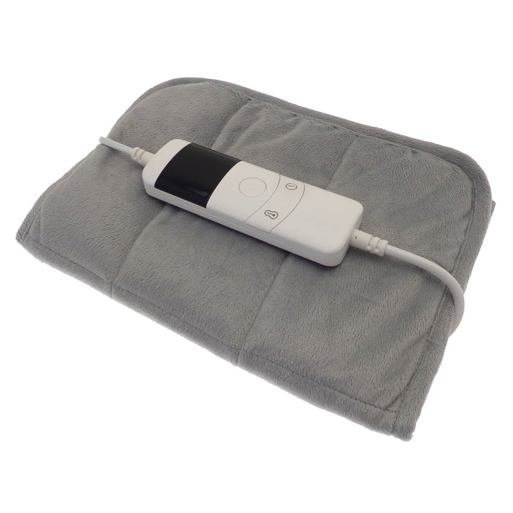 Grey quilted heat pad with controller on a white background