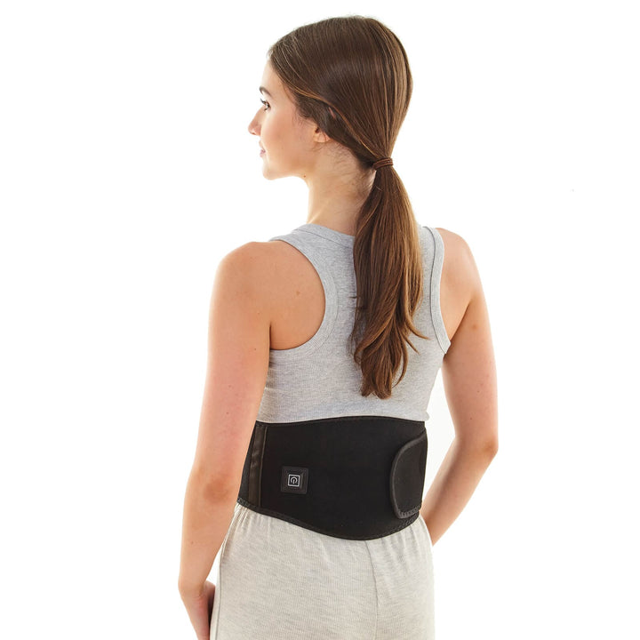 Back view of a person wearing a waist belt with heating power switch
