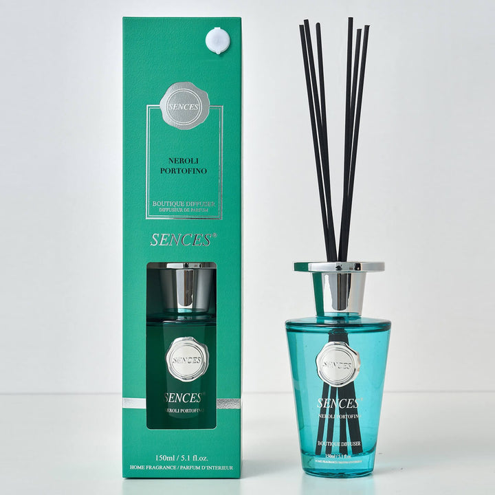 Sences Neroli Portofino Reed diffuser with blue glass bottle, black reeds and gift box packaging