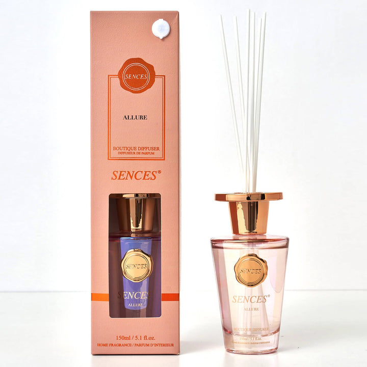 Sences Allure Reed diffuser with pink glass bottle, white reeds and gift box packaging