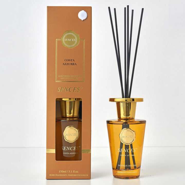 Sences Costa Azzurra Reed diffuser with orange glass bottle, black reeds and gift box packaging