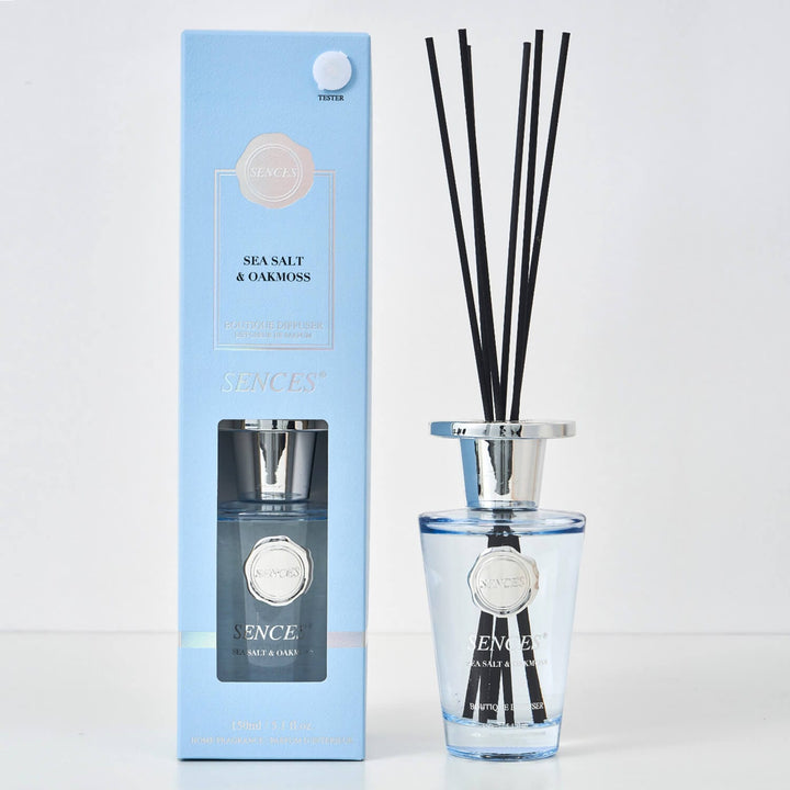 Sences Sea Salt & Oakmoss Reed diffuser with blue glass bottle, black reeds and gift box packaging