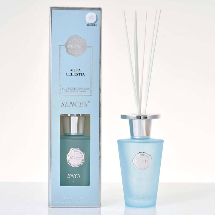 Sences Aqua Celestia Reed diffuser with frosted blue glass bottle, black reeds and gift box packaging