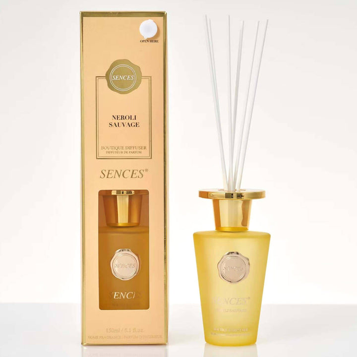 Sences Neroli Sauvage Reed diffuser with yellow glass bottle, black reeds and gift box packaging