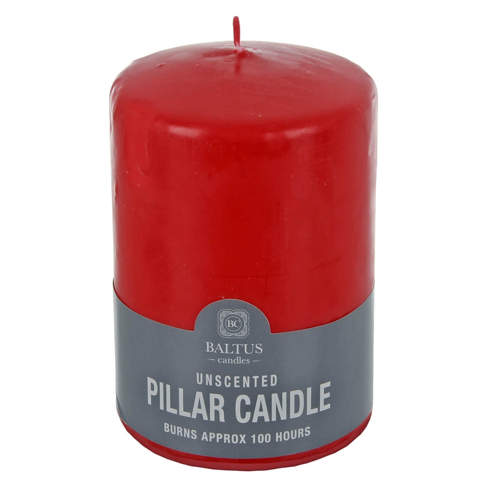 Large red pillar candle with a grey label on a white background