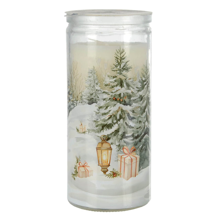 Decorative candle with winter scene design featuring trees, lanterns, and presents.