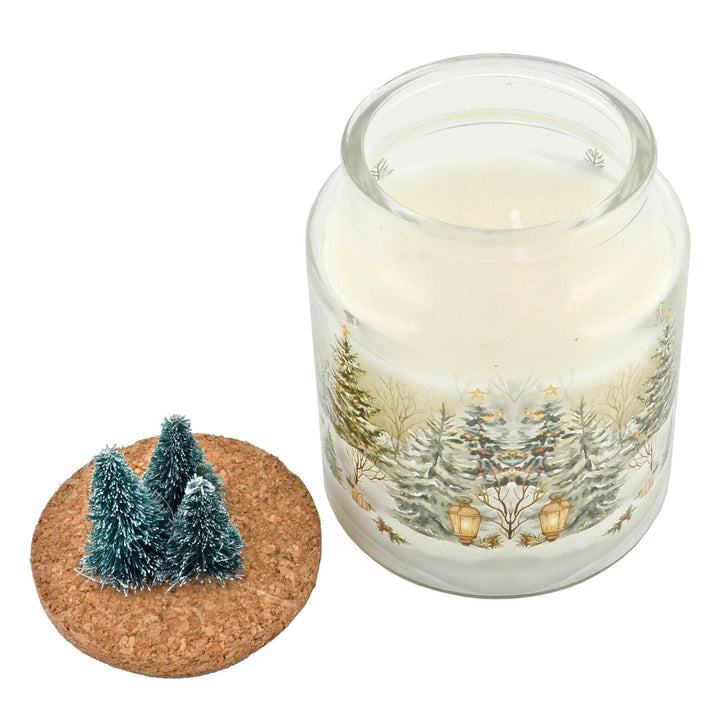Christmas candle in a glass jar with winter scene design on a white background