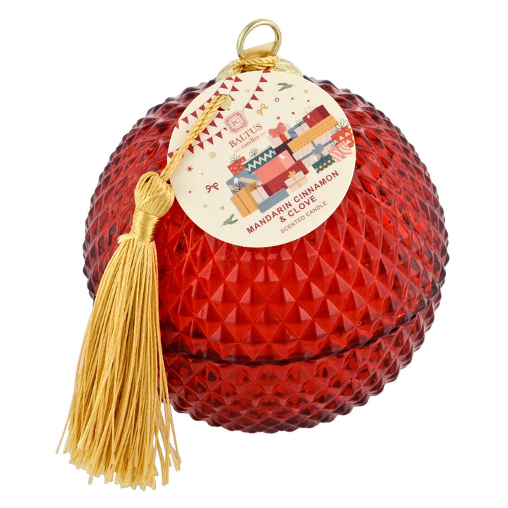 Mandarin Cinnamon and clove scented candle in red glass bauble shape holder