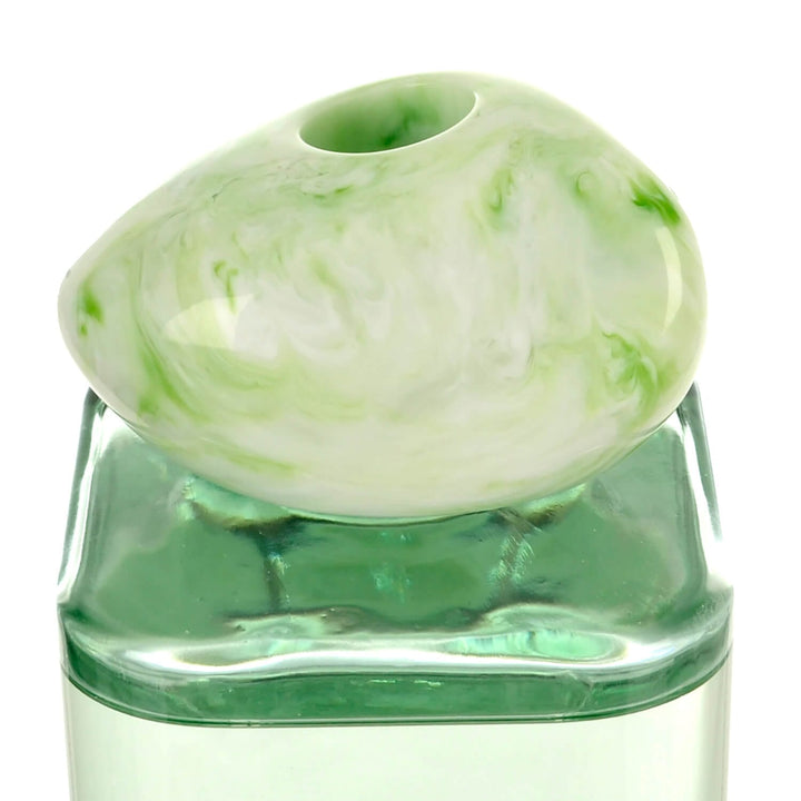 Close up of a green marbled stone effect bottler topper