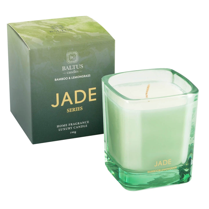 Green glass candle with Jade branding and gift box pack