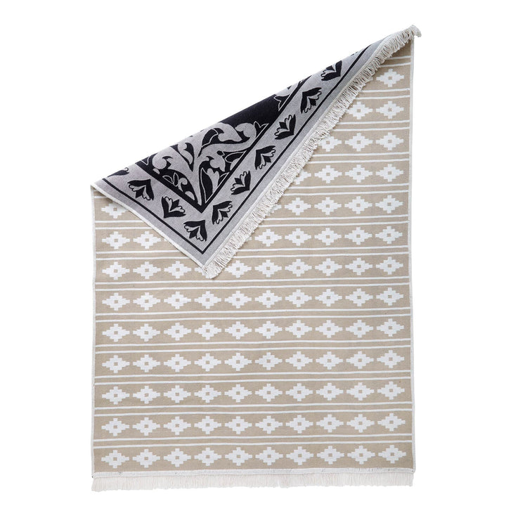 Natural colour Aztec pattern rug with black and white reverse