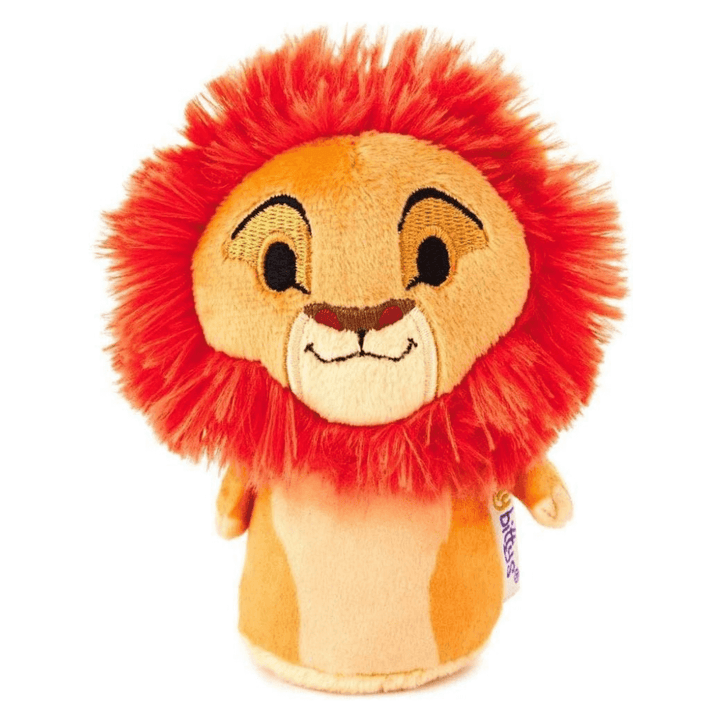 Plush lion toy with a red mane on a white background the lion king