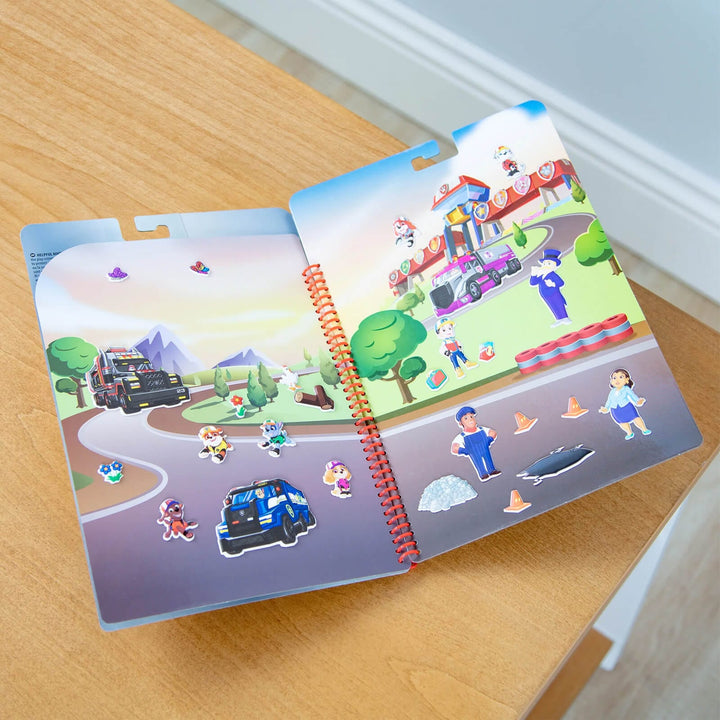 Open pages from a PAW Patrol puffy stickers activity book