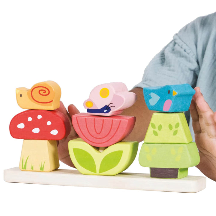 Colourful woodland garden stacker toy with animals on a white background