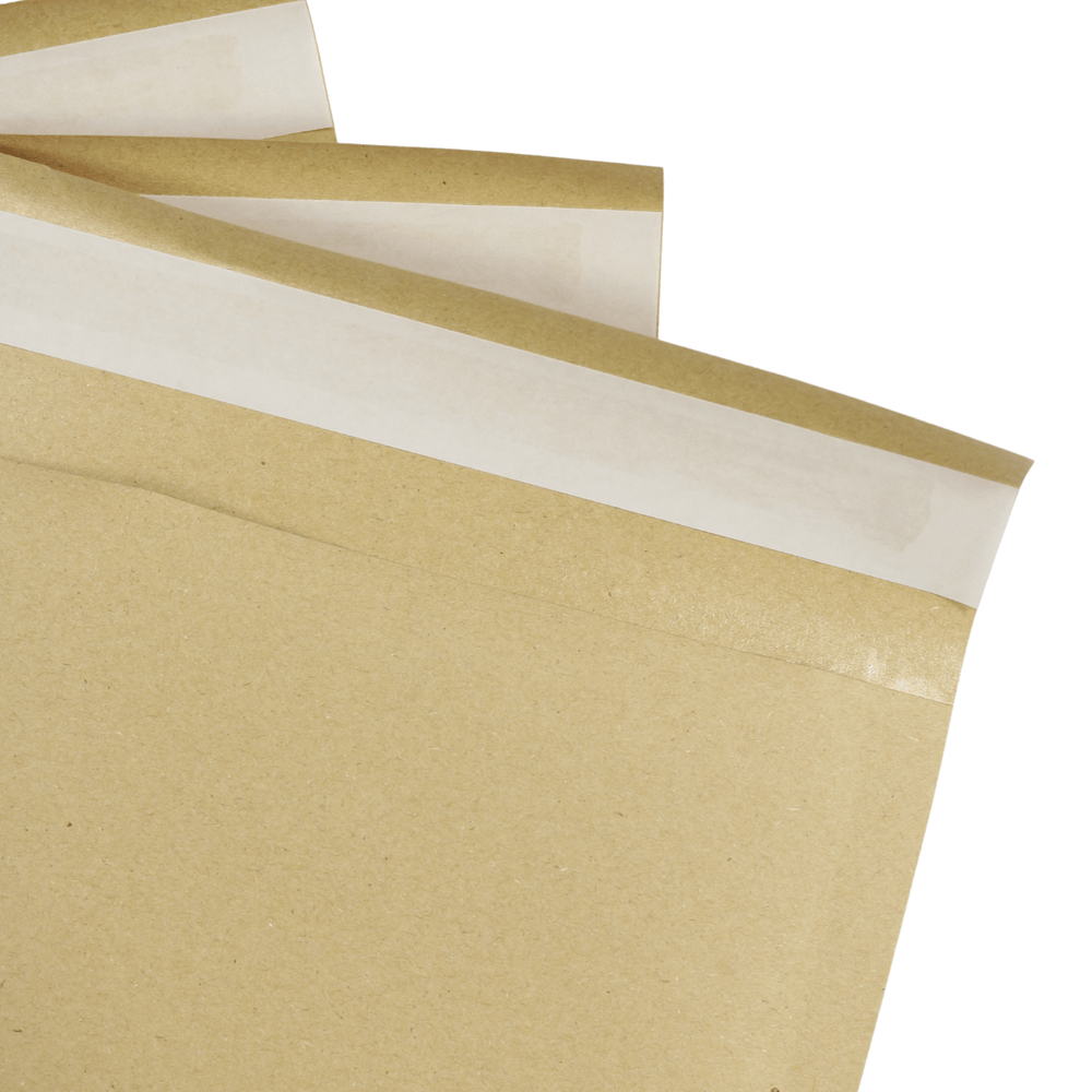 detail shot of white tap over self adhesive strip on brown envelope