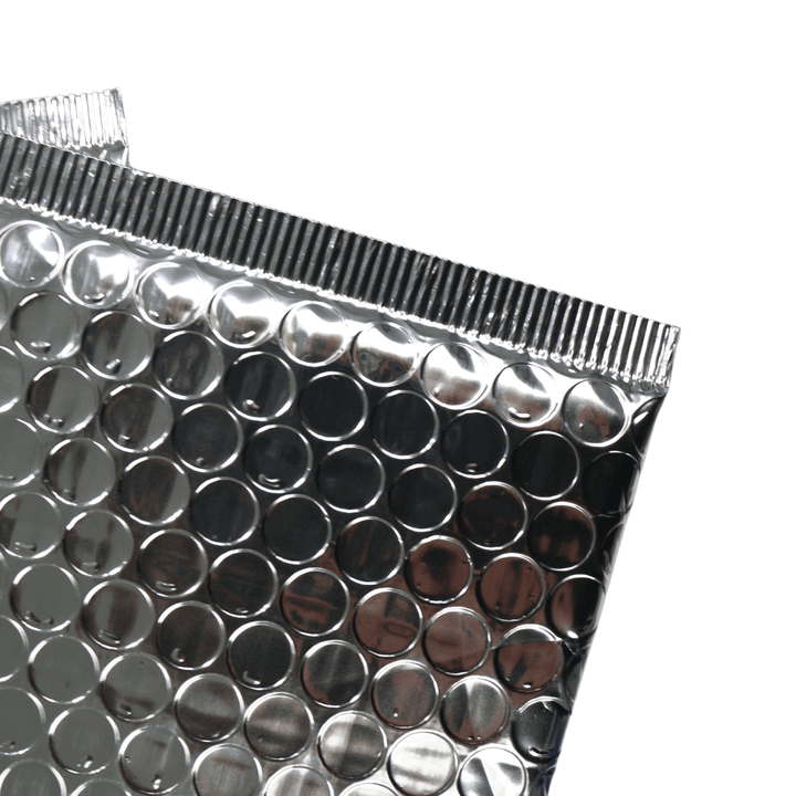 detail shot of ridged edges on silver mailer envelope