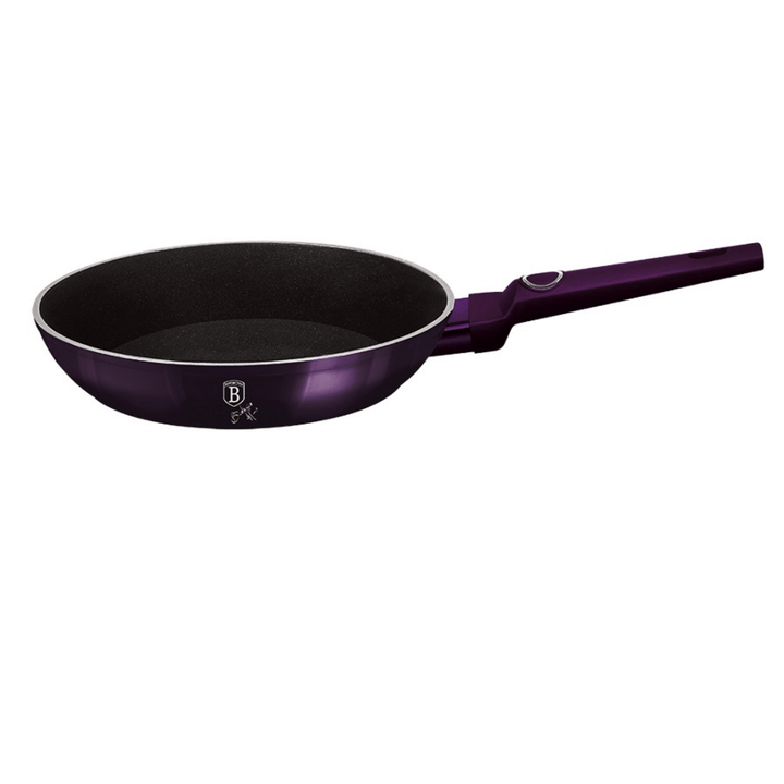 Black frying pan with purple handle on a white background