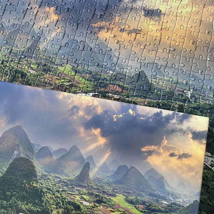 detail shot of jigsaw pieces added together to create sky over guilan field in china