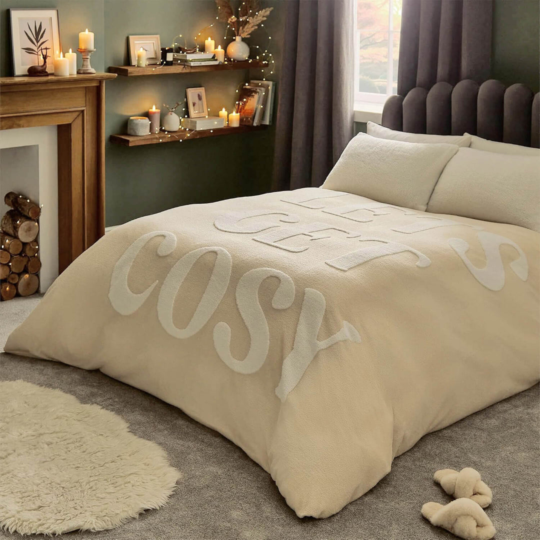 Lets get cosy cream and white duvet on a bed in a cosy bedroom