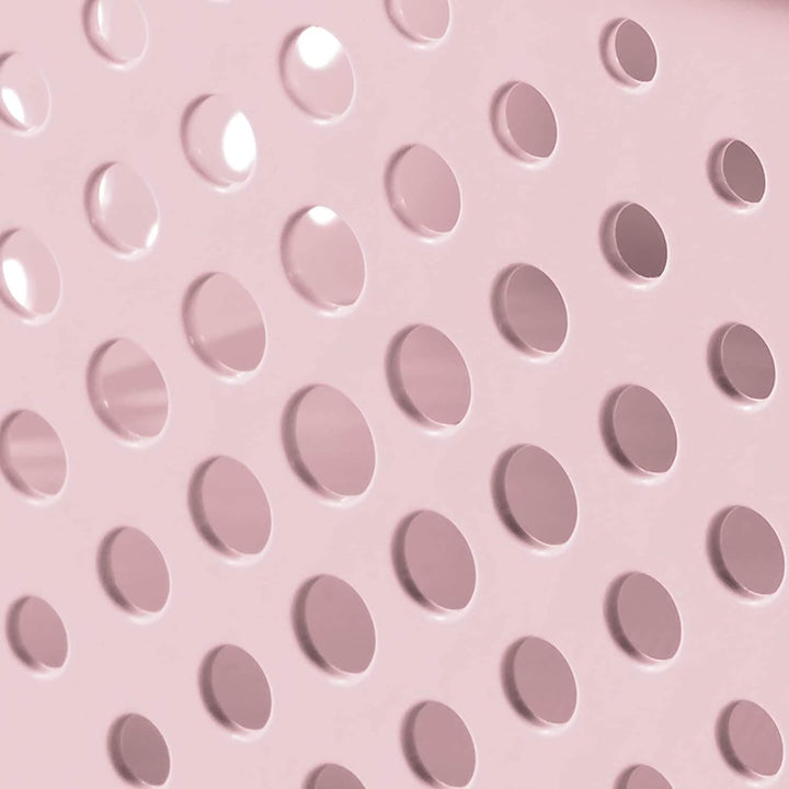 Close up of Infinity dots on a pink storage box