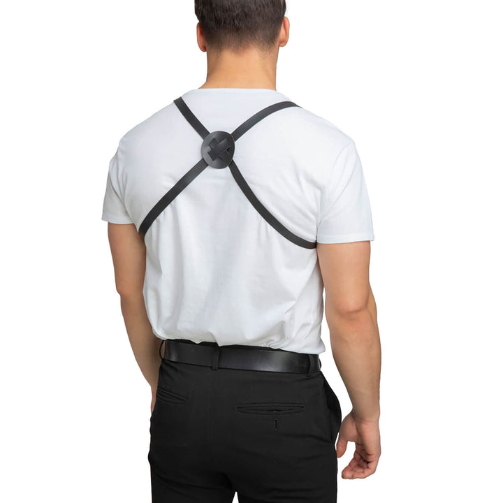 Back view of a person wearing a shoulder holster crossed over on a white shirt