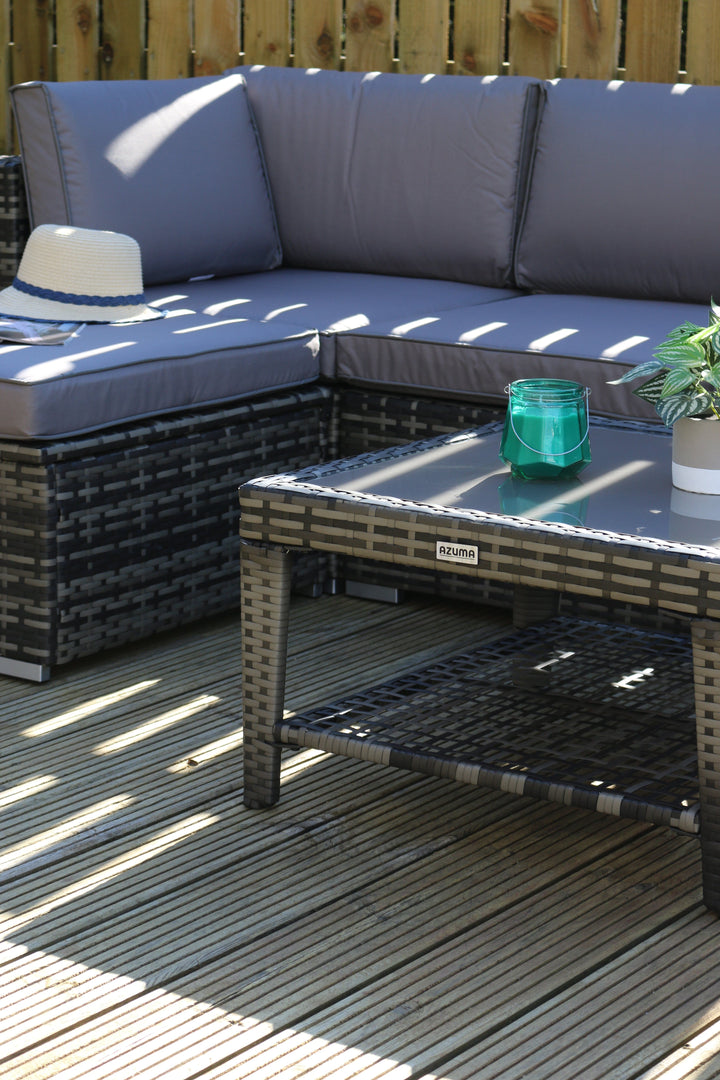 detail shot of monaco table with azuma brand table on the side and grey coloured glass table top