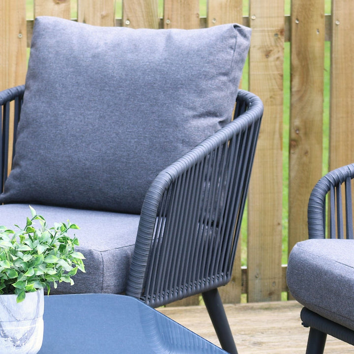detail shot of rope chair set in grey colour with grey coloured thick cushions