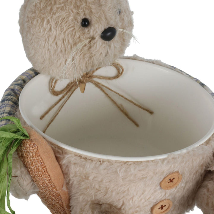 top view of bucket with plush bunny holding it