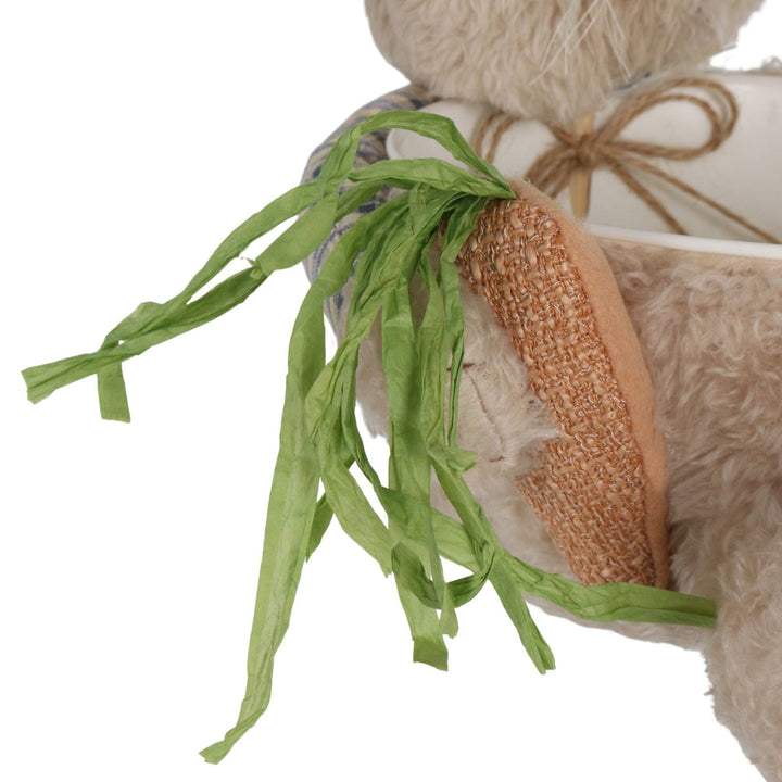 detail shot of plush textured carrot with straw like green top
