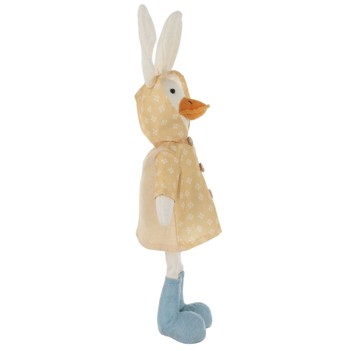 side view of plush figure with rabbit ears and a yellow raincoat on a white background