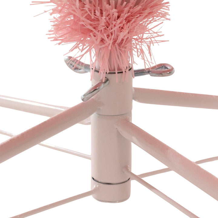 white metal stand with silver screws to secure christmas tree
